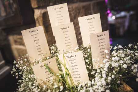 Seating cards among babies breath