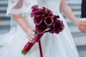 Striking bouquet of burgundy Calla Lilies