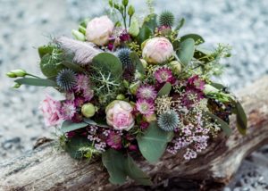 Bridal bouquet in rustic style with gorgeous peach ruby and lavender blooms