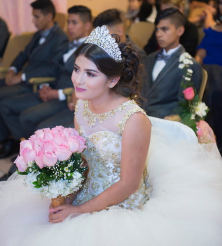 Mexicali, Baja California/ Mexico> Nov-17-2018: A Latin Mexican teenager, attending mass for her quincea単era or 15th birthday as part of Mexican traditional celebration.
