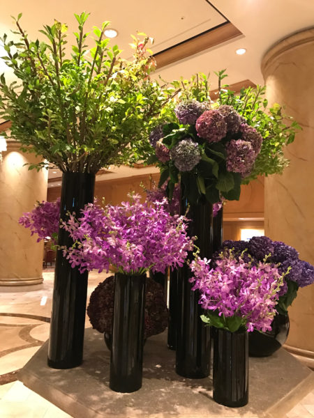 Beautiful floral decor in a luxury hotel lobby.