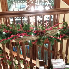 Banister with holiday garland