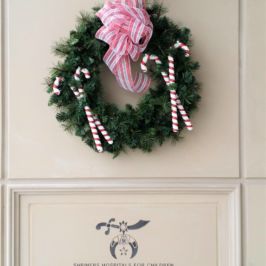 Holiday wreath with candy canes & ribbon