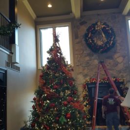 Setup of Christmas tree and holiday decor