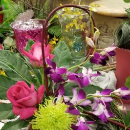 Centerpiece with green and purple flowers