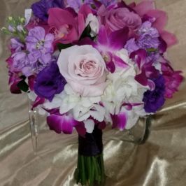 Arrangement of purple and white flowers