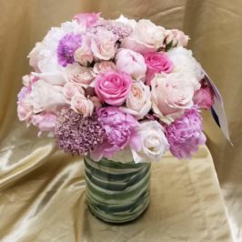 Arrangement of flowers in shades of pink and purple