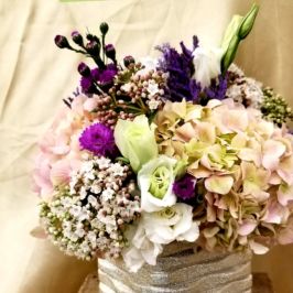 Arrangement of pink, purple and white flowers