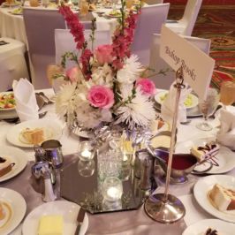 Reception with pink and white floral centerpieces