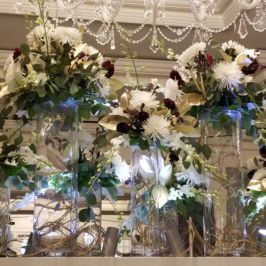 Tall centerpieces of white flowers