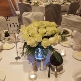 Table centerpiece of white flowers