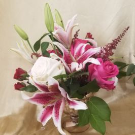 Arrangement of bright pink and white flowers