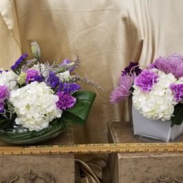 Arrangements of white and purple flowers