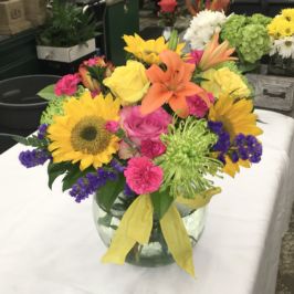 Bubble bowl vase of bright flowers