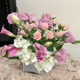 Cube arrangement with soft pink and white flowers