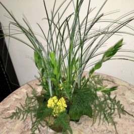 Centerpiece with beargrass and yarrow